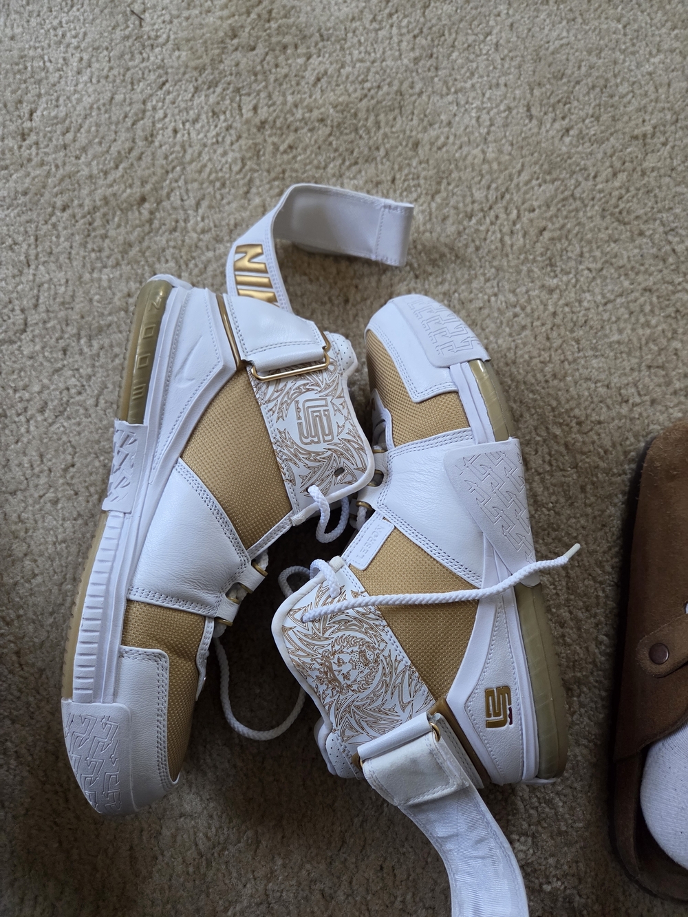 Nike Lebron's Gold and White Low-Top Sneakers with Decorative Strap